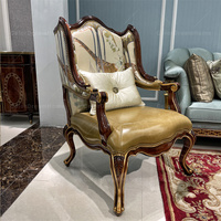 Fauteuil en cuir de luxe royal pour salon, sculpture exquise