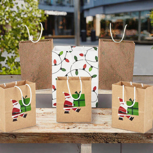 Wholesale Reusable Kraft Paper <b>Christmas</b> <b>Gift</b> <b>Bags</b> with Custom Printed Logo for Holiday Party <b>Gifts</b> and Craft Packaging - Product Image 3