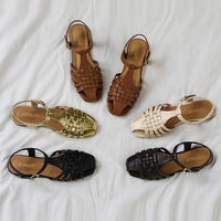 Nouvelles sandales plates d'été tissées ajourées pour femmes, à semelle souple, confortables, avec boucle monobloc, style romain pour les vacances