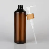 Botol Kosmetik Plastik PET Amber yang Dapat Disesuaikan dengan Tutup Pompa Kayu Bambu untuk Serum Perawatan Kulit, Lotion, Logo Kustom, Mewah Ringan