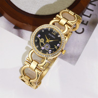 Montre-bracelet à quartz pour femme, style rétro, avec strass et cadran ajouré, multicolore, haute esthétique, pour usage quotidien, cadeau, vente en gros