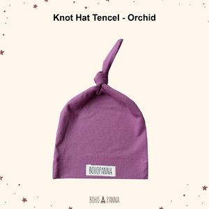Gorro de bebé premium de tencel orquídea, confeccionado con tela suave y sedosa, transpirable y de ajuste flexible para cabezas pequeñas y delicadas. - Product Image 1