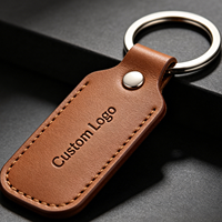 Porte-clés en métal et cuir PU tendance, gravure personnalisée, vente en gros, cadeau d'entreprise pour hommes