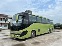 Un lot de véhicules utilitaires Jinlong à gaz naturel (GNL) de 34 places (configuration 2+1) configurés pour les régions du nord.