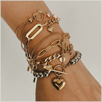 Bracelet en acier inoxydable européen avec perle en forme de cœur pour femmes, fermoir OT, bijoux de luxe en acier titane