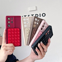 Stijlvolle matte siliconen zuignap hoesje met verborgen standaard voor iPhone 18 17 Pro Max 16 15 14 13, beschermende selfie grip fidget cover