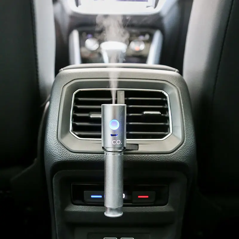 New product 2024 USB rechargeable mini air freshener 15ml humidifier aroma oil diffuser use for car easy to carry