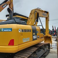En stock : Excavatrice Komatsu PC160 d'occasion, haute performance pour travaux de rénovation de chantier