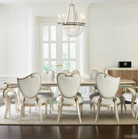 Ensemble de table à manger rectangulaire en bois massif de style français luxueux, fait main, couleur champagne doré, avec 8 chaises rembourrées à dossier en forme de S