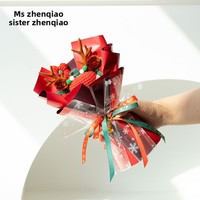 Produit fini artisanal de Noël chinois : un bouquet de pommes, de roses et de fleurs séchées, cadeau de Noël