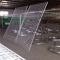 Panneau mural multifonctionnel en grille de fil de fer robuste, écologique et imperméable pour la décoration de magasin