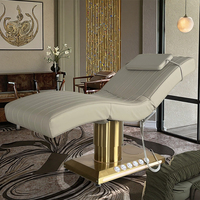 Lit de beauté électrique HAOYU de luxe moderne pour salon de beauté, prix d'usine, 3 moteurs, base en acier inoxydable doré, cuir PU, pliable