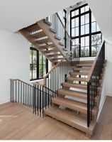 Escalier flottant à tube carré avec structure à poutre unique, doté d'éclairage LED pour les marches et d'escaliers en bois