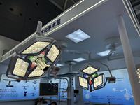 Lampe chirurgicale LED sans ombre à double tête pour bloc opératoire avec système de caméra et moniteur HD