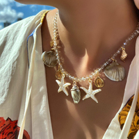 Collier de plage bohème transfrontalier : Bijou pendentif en faux perles, coquillages, étoiles de mer et conques