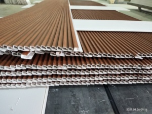 Panel de techo de PVC barato Panel de pared de PVC laminado de madera Tejas de techo para decoración de interiores - Product Image 6