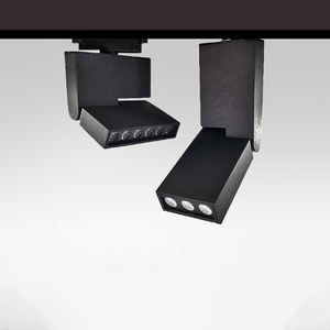 Les lumières <span class=keywords><strong>de</strong></span> rail <span class=keywords><strong>de</strong></span> ligne <span class=keywords><strong>de</strong></span> LED plient et tournent pour ajuster les projecteurs montés en surface dans le salon du <span class=keywords><strong>magasin</strong></span> <span class=keywords><strong>de</strong></span> vêtements du Musée - Product Image 1
