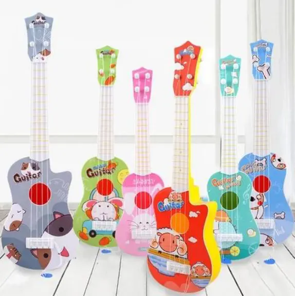 नींबू बच्चों के सिमुलेशन उपकरण मिनी चार तार खिलौना गिटार प्रज्ञान संगीत खेल सकते हैं