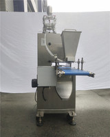 Machine de fabrication de pâtisserie, pour arrosage de blancs d'œuf et de sésame