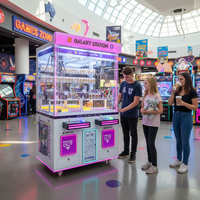 Machine à griffes commerciale 2 joueurs avec lecteur de cartes et validateur de billets pour parcs d'attractions et centres commerciaux
