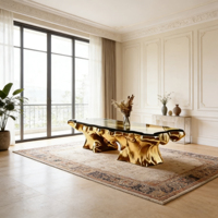 Table basse moderne de luxe en verre noir avec base en fibre de verre dorée pour salons contemporains