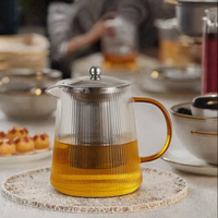 Théière en verre borosilicate avec infuseur pour thé aux fruits et aux fleurs, idéale pour les occasions festives