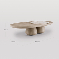 Table basse résidentielle Dream Home en matériaux mixtes, plateau ovale arrondi en marbre et bois, pieds massifs bombés