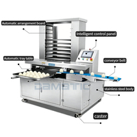 Machine automatique de positionnement précis pour l'agencement de pâtisseries (gâteaux au pain, gâteaux à l'ananas, pâtisseries aux flocons de noix de coco, shortbread, mochi, mooncakes) sur plateau