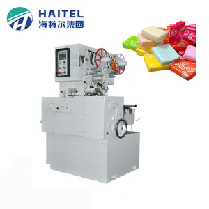 Machine à couper et à emballer les bonbons <span class=keywords><strong>Sugus</strong></span> à double torsion Machine à couper et emballer les bonbons Toffee Taffy pour la fabrication - Product Image 1