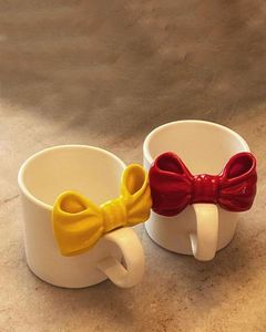 Venta superior creativo blanco buena calidad cerámica <span class=keywords><strong>pintar</strong></span> tu propia taza bowknot taza - Product Image 3