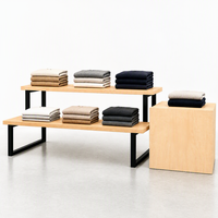 Table de présentation en bois à deux niveaux, noire, avec pieds en U, présentoir de vêtements pliable pour îlot commercial, socle pour logo, vente en gros