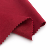 Tissu tricoté extensible respirant en polyester/spandex teint en rouge rose, de poids moyen, personnalisable, largement utilisé pour les vêtements et l'habillement de maison pour filles.