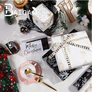 กระดาษห่อของขวัญคริสต์มาสพรีเมียมแบบใหม่ พร้อมลายปั๊มฟอยล์ทองและเอฟเฟกต์โฟม ขายส่ง - Product Image 3
