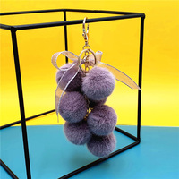 Porte-clés créatif en peluche en forme de pamplemousse, pendentif mignon pour sac, avec nœud en dentelle et boule de fourrure, pour clés de voiture