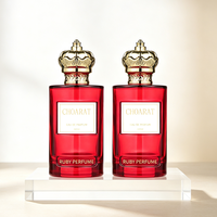 Großhandel Beliebtes Design Elegante Rubinrote Runde Parfümflasche 100ml Luxuriöse Glas-Duftflasche für Damen