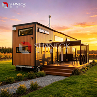 Maisons modulaires préfabriquées de luxe avec toit solaire, maison capsule en acier étanche, appartement préfabriqué 20ft/40ft, mini-hôtel