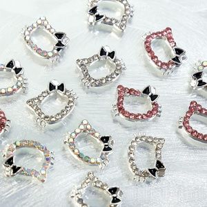 Venta al por mayor: Nueva decoración de <span class=keywords><strong>uñas</strong></span> 3D de <span class=keywords><strong>Hello</strong></span> <span class=keywords><strong>Kitty</strong></span> con lazo de diamantes y perlas huecas para accesorios DIY - Product Image 1