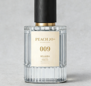 PEACH JO+ Fragancia Amaderada de Melocotón y Oud, unisex, aroma ligero y duradero. - Product Image 1