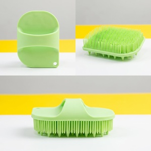 Cepillo de masaje ergonómico ovalado de silicona para el cuero cabelludo, de doble cara con cerdas suaves, para lavado de cabello y masaje relajante, con orificio para colgar - Product Image 1