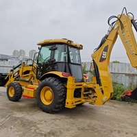Chargeuse-pelleteuse d'occasion CAT 420F à faible nombre d'heures de fonctionnement, avec système hydraulique à détection de charge, pour le creusement de canalisations municipales et l'aménagement paysager