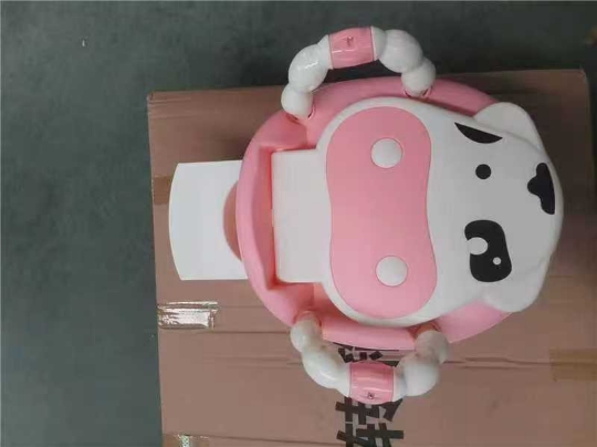 ลิ้นชักวัวสีชมพู (ชามถูกดึงออกมาจากด้านหลัง)