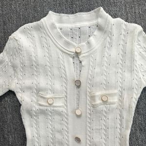 Robe élégante en tricot blanc avec jupe plissée Chic Stylisée pour toutes les <span class=keywords><strong>occasions</strong></span> Robes Vêtements pour femmes - Product Image 3