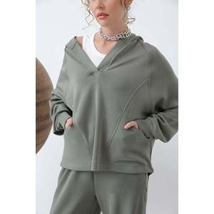 เสื้อสเวตเชิ้ตแบบอสมมาตรสำหรับผู้หญิง ถักทอระบายอากาศได้ดี สีขาว แขนยาว สำหรับใส่ลำลอง - Product Image 6