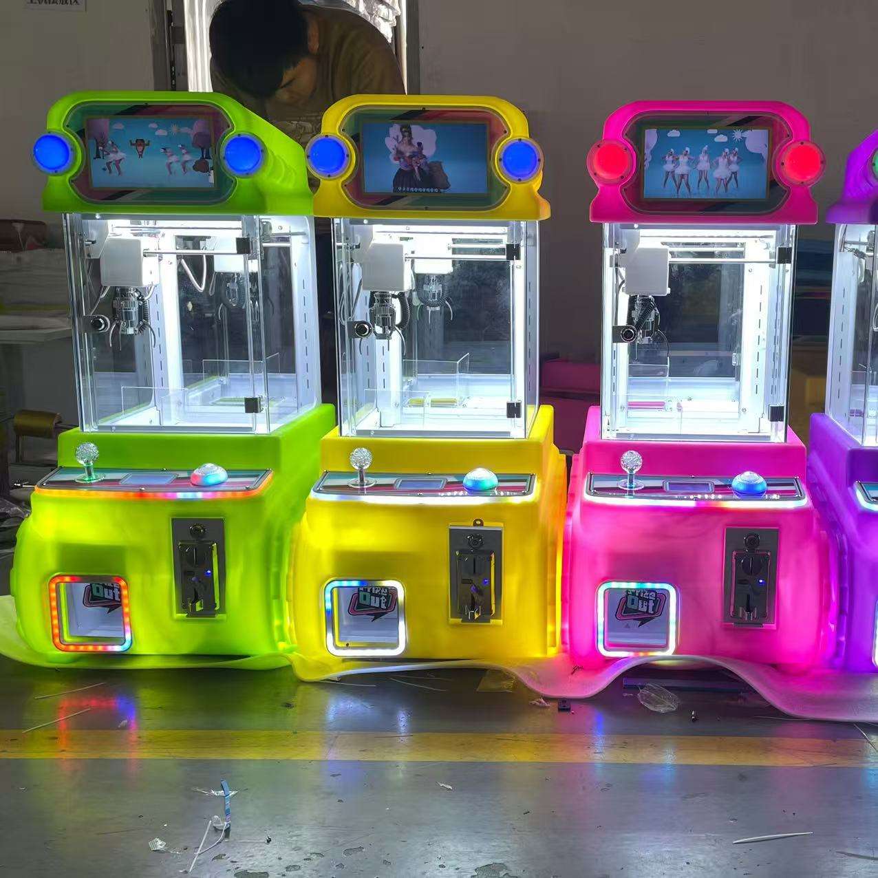 Doll machine with display screen
