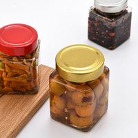 Pot carré de bouteille de miel en verre à épices