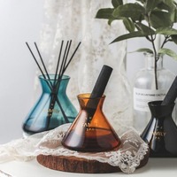 Bouteilles personnalisées de diffuseur de roseaux d'aromathérapie avec bâtonnets petits mini vases pour la décoration intérieure bouteille d'huile de parfum