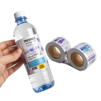Rouleau d'autocollants adhésifs transparents imperméables personnalisés pour les étiquettes de bouteilles de vin, de jus, de thé, de café et de boissons