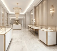 Îlot de présentation de bijoux haut de gamme en marbre blanc et or, vitrine en verre premium pour les boutiques de bijoux de luxe