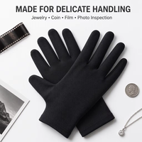 Gants photo d'archives Gants de travail noirs Gants en tissu Doublures en vrac pour la manipulation de bijoux, de films, de photos, d'inspection de pièces de monnaie