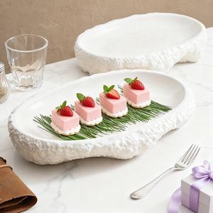 أطباق تقديم سيراميك بيضاء بيضاوية مصنوعة يدويًا بنمط صخري اسكندنافي إبداعي للأطباق الباردة العميقة - Product Image 2